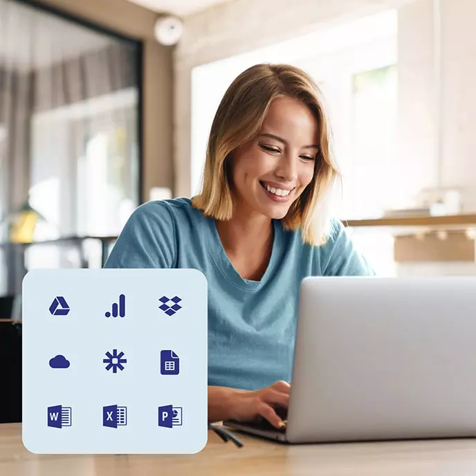 A marketing manager creating a survey on her laptop