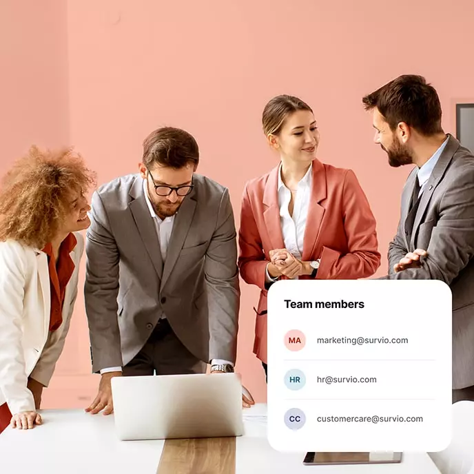 Team members discussing survey results in a meeting room