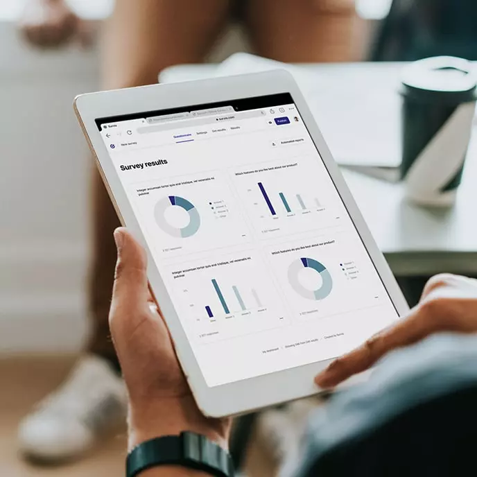 Tablet showing survey results in a BI dashboard